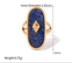 Gold ring with blue stone and gold accent, showing measurements and weight on a white background.