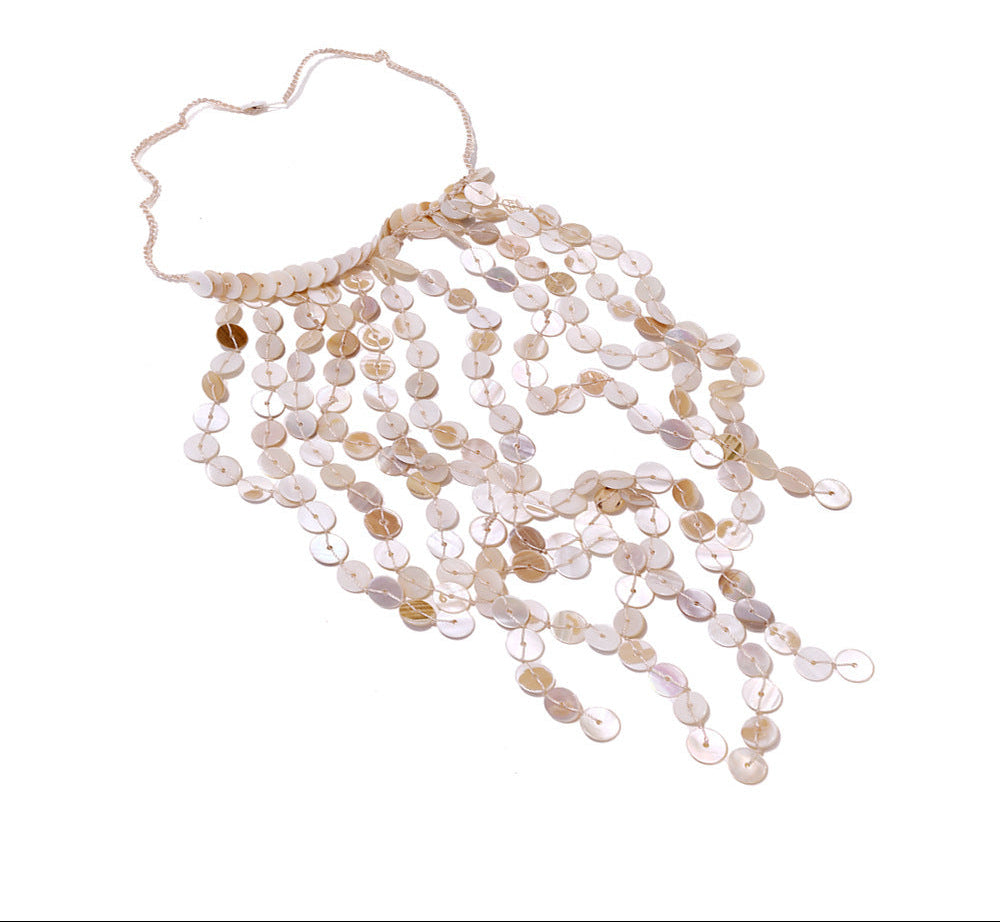 Necklace with shell beads on a white background