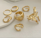 Set of gold rings on a light background