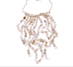 Necklace with circular beads on a white background