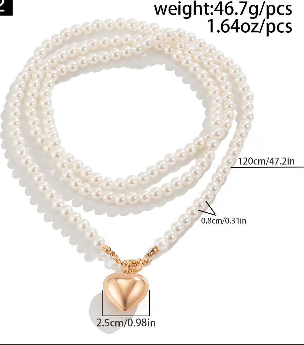 Pearl necklace with a heart pendant on a white background, showing weight, length, and diameter measurements.