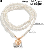 Pearl necklace with a heart pendant on a white background, showing weight, length, and diameter measurements.