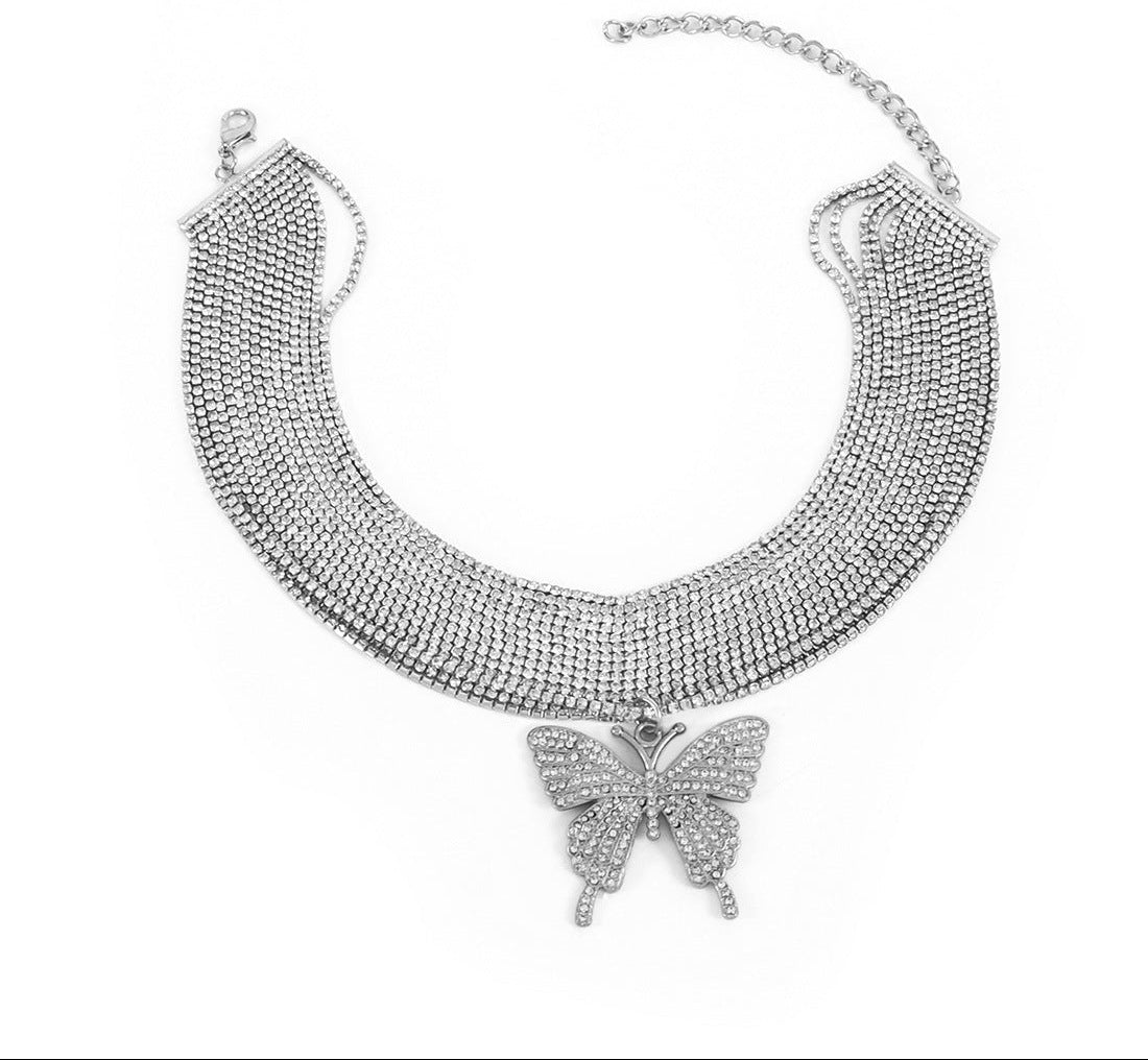 Silver butterfly necklace on a white background