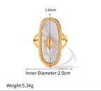 Gold ring with a white stone, showing measurements and weight on a white background.